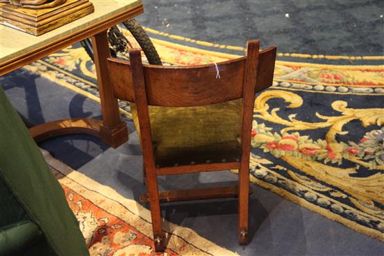 A Reformed Gothic oak dining chair, designed by Edward Welby Pugin, c.1864,